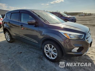 Czwarte zdjęcie samochodu z boku: 2017 FORD ESCAPE SE VIN:1FMCU9G91HUB94189 - miniatura