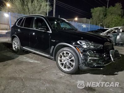 Czwarte zdjęcie samochodu z boku: 2023 BMW X5 XDRIVE45E VIN:5UXTA6C01P9P57261 - miniatura