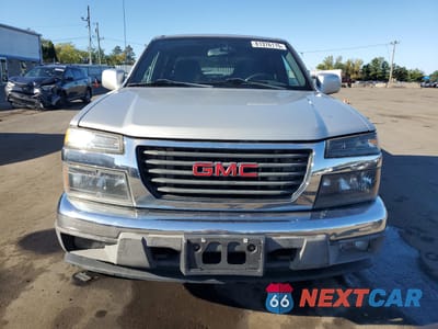 Piąte zdjęcie samochodu w środku: 2012 GMC CANYON SLE VIN:1GTH6MFE6C8108446 - miniatura