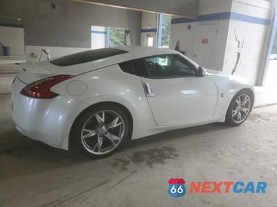 Trzecie zdjęcie samochodu z tyłu: 2009 NISSAN 370Z VIN:JN1AZ44E39M411439 - miniatura