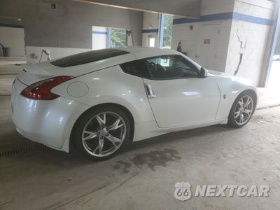 Trzecie zdjęcie samochodu z tyłu: 2009 NISSAN 370Z VIN:JN1AZ44E39M411439 - miniatura