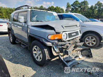 Czwarte zdjęcie samochodu z boku: 2014 TOYOTA FJ CRUISER VIN:JTEBU4BF3EK183441 - miniatura