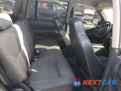 Zdjęcie 11 z 13 samochodu: 2003 DODGE DURANGO SPORT VIN:1D4HS38N03F579011 - miniatura