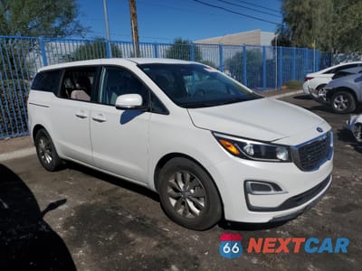 Czwarte zdjęcie samochodu z boku: 2021 KIA SEDONA LX VIN:KNDMB5C11M6663240 - miniatura