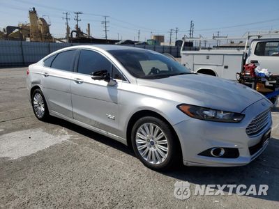Czwarte zdjęcie samochodu z boku: 2016 FORD FUSION SE PHEV VIN:3FA6P0PU1GR195301 - miniatura