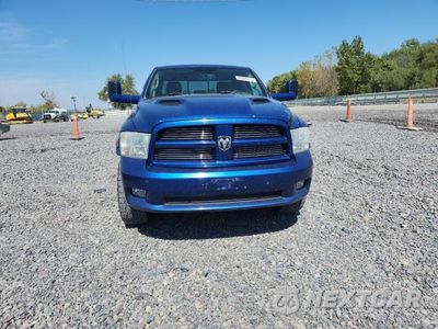 Piąte zdjęcie samochodu w środku: 2011 DODG RAM 1500 VIN:1D7RV1GT1BS609738 - miniatura
