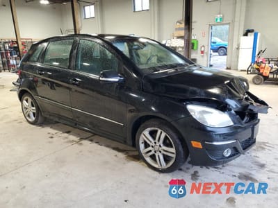 Czwarte zdjęcie samochodu z boku: 2011 MERCEDES-BENZ B200 VIN:WDDFH3DB7BJ704568 - miniatura