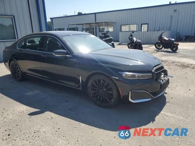 Czwarte zdjęcie samochodu z boku: 2022 BMW 740 XI VIN:WBA7T4C0XNCH65571 - miniatura