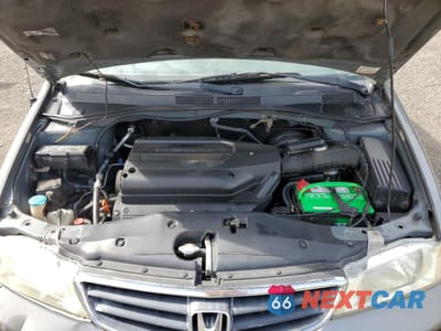 Zdjęcie 12 z 15 samochodu: 2002 HONDA ODYSSEY EXL VIN:2HKRL18092H511642 - miniatura