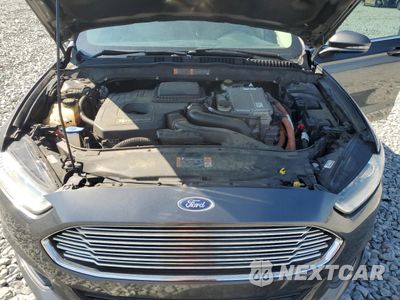 Zdjęcie 11 z 14 samochodu: 2016 FORD FUSION SE HYBRID VIN:3FA6P0LU1GR388747 - miniatura