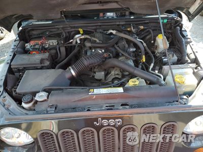 Zdjęcie 11 z 12 samochodu: 2011 JEEP WRANGLER SAHARA VIN:1J4AA5D11BL638030 - miniatura