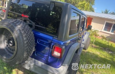 Czwarte zdjęcie samochodu z boku: 2019 JEEP WRANGLER UNLIMITED SPORT VIN:1C4HJXDG8KW500844 - miniatura