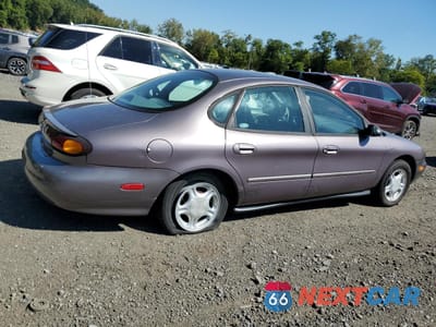 Trzecie zdjęcie samochodu z tyłu: 1996 FORD TAURUS GL VIN:1FALP52U9TA247169 - miniatura