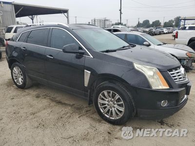 Czwarte zdjęcie samochodu z boku: 2014 CADILLAC SRX PREMIUM COLLECTION VIN:3GYFNDE31ES633705 - miniatura