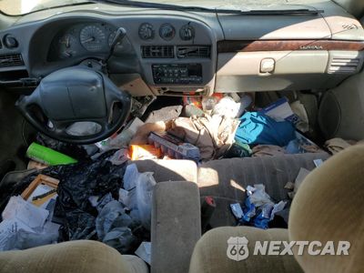Zdjęcie 8 z 13 samochodu: 2000 CHEVROLET LUMINA VIN:2G1WL52J5Y1317625 - miniatura