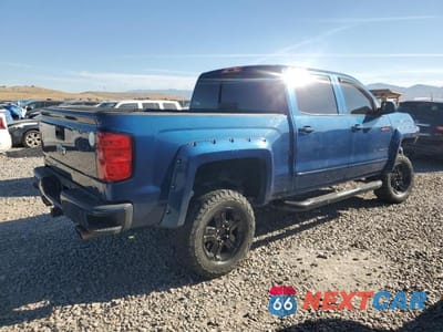 Trzecie zdjęcie samochodu z tyłu: 2017 CHEVROLET SILVERADO K1500 LT VIN:3GCUKREC4HG103609 - miniatura