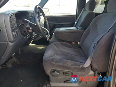 Zdjęcie 7 z 14 samochodu: 1999 GMC NEW SIERRA K1500 VIN:1GTEK19T8XZ535635 - miniatura