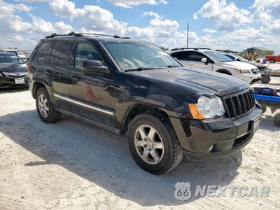 Czwarte zdjęcie samochodu z boku: 2010 JEEP GRAND CHEROKEE LAREDO VIN:1J4PR4GK0AC157945 - miniatura