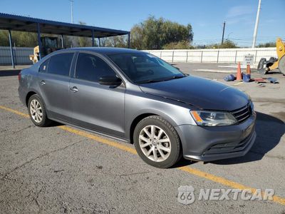 Czwarte zdjęcie samochodu z boku: 2015 VOLKSWAGEN JETTA SE VIN:3VWD07AJ1FM298370 - miniatura