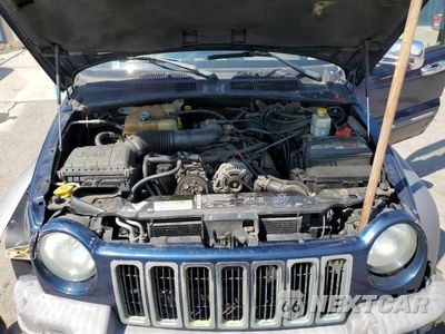 Zdjęcie 12 z 13 samochodu: 2004 JEEP LIBERTY SPORT VIN:1J4GL48K74W271654 - miniatura