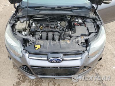Zdjęcie 11 z 14 samochodu: 2013 FORD FOCUS TITANIUM VIN:1FADP3N22DL231906 - miniatura