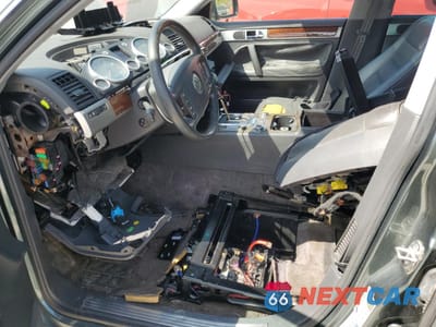 Zdjęcie 7 z 13 samochodu: 2004 VOLKSWAGEN TOUAREG 4.2 VIN:WVGEM77L84D046978 - miniatura