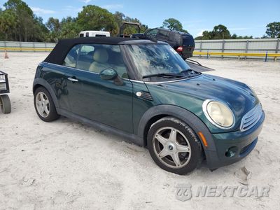 Czwarte zdjęcie samochodu z boku: 2010 MINI COOPER VIN:WMWMR3C51ATU98674 - miniatura