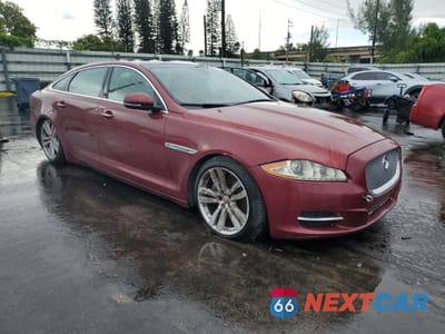 Czwarte zdjęcie samochodu z boku: 2014 JAGUAR XJL PORTFOLIO VIN:SAJWA2GZ1E8V65729 - miniatura