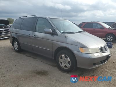 Czwarte zdjęcie samochodu z boku: 2000 HONDA ODYSSEY EX VIN:2HKRL1866YH506587 - miniatura
