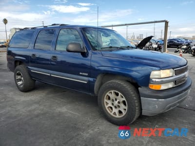 Czwarte zdjęcie samochodu z boku: 2000 CHEVROLET SUBURBAN C1500 VIN:3GNEC16T5YG192132 - miniatura