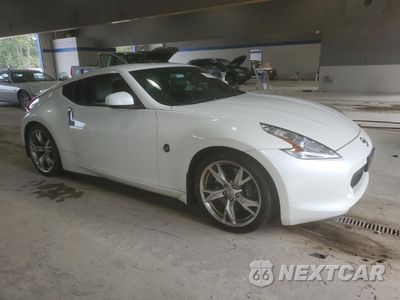 Czwarte zdjęcie samochodu z boku: 2009 NISSAN 370Z VIN:JN1AZ44E39M411439 - miniatura