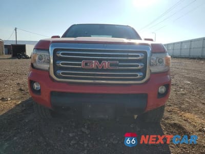Piąte zdjęcie samochodu w środku: 2015 GMC CANYON SLE VIN:1GTH6BEA5F1156309 - miniatura