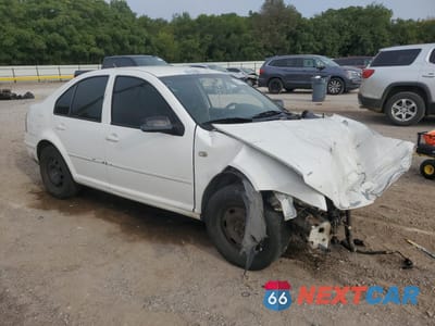 Czwarte zdjęcie samochodu z boku: 2002 VOLKSWAGEN JETTA GL TDI VIN:3VWRP69M42M047766 - miniatura