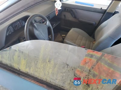 Zdjęcie 7 z 11 samochodu: 1994 MAZDA PROTEGE DX VIN:JM1BG2248R0778768 - miniatura