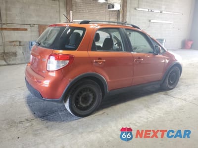 Trzecie zdjęcie samochodu z tyłu: 2011 SUZUKI SX4 VIN:JS2YB5A36B6302952 - miniatura