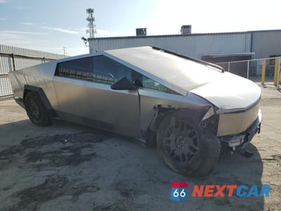Czwarte zdjęcie samochodu z boku: 2024 TESLA CYBERTRUCK VIN:7G2CEHED5RA012985 - miniatura