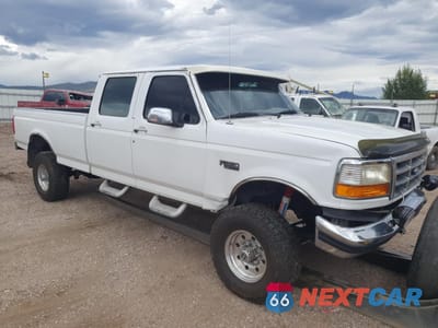 Czwarte zdjęcie samochodu z boku: 1996 FORD F350 VIN:1FTJW36G6TEB23639 - miniatura