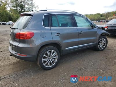 Trzecie zdjęcie samochodu z tyłu: 2014 VOLKSWAGEN TIGUAN S VIN:WVGBV3AX3EW594879 - miniatura