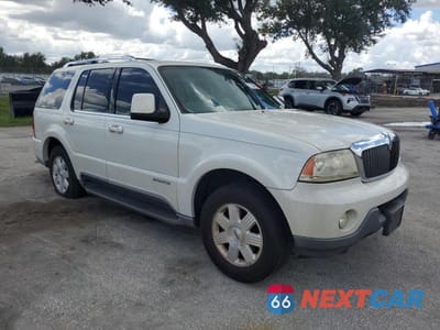 Czwarte zdjęcie samochodu z boku: 2004 LINCOLN TOWNHOUSE AVIATOR VIN:5LMEU68H94ZJ14743 - miniatura