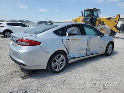 Trzecie zdjęcie samochodu z tyłu: 2018 FORD FUSION SE HYBRID VIN:3FA6P0LU0JR100935 - miniatura