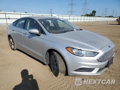 Czwarte zdjęcie samochodu z boku: 2017 FORD FUSION SE HYBRID VIN:3FA6P0LU1HR385350 - miniatura