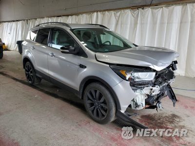 Czwarte zdjęcie samochodu z boku: 2017 FORD ESCAPE TITANIUM VIN:1FMCU9J92HUA77942 - miniatura