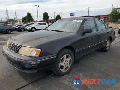 1999 TOYOTA AVALON 4T1BF18B3XU329096 - główne zdjęcie licytacji z USA - miniatura