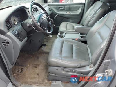 Zdjęcie 7 z 13 samochodu: 2002 HONDA ODYSSEY EXL VIN:5FNRL18982B031377 - miniatura