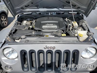 Zdjęcie 12 z 13 samochodu: 2015 JEEP WRANGLER UNLIMITED SPORT VIN:1C4BJWDG0FL767306 - miniatura