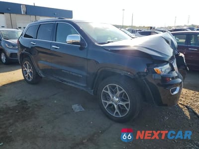 Czwarte zdjęcie samochodu z boku: 2021 JEEP GRAND CHEROKEE OVERLAND VIN:1C4RJFCGXMC544042 - miniatura