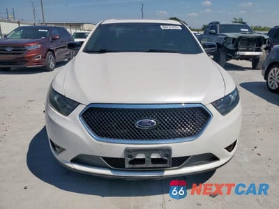 Piąte zdjęcie samochodu w środku: 2015 FORD TAURUS SHO VIN:1FAHP2KT4FG100500 - miniatura