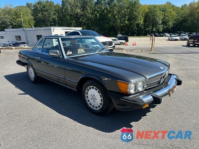 Czwarte zdjęcie samochodu z boku: 1987 MERCEDES-BENZ 560 SL VIN:WDBBA48D6HA072118 - miniatura