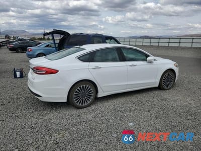 Trzecie zdjęcie samochodu z tyłu: 2018 FORD FUSION SE VIN:3FA6P0HD6JR204029 - miniatura
