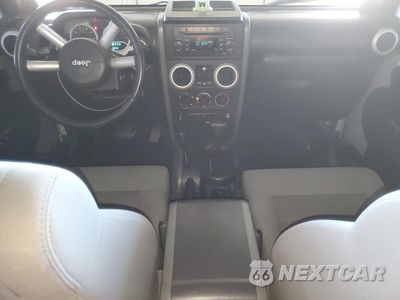 Zdjęcie 8 z 15 samochodu: 2008 JEEP WRANGLER UNLIMITED SAHARA VIN:1J4GA59188L642152 - miniatura